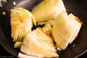 Oil and lemon marinated cabbage with roasted hazelnuts