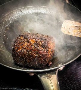 Beef tenderloin with mixed vegetables in a pan