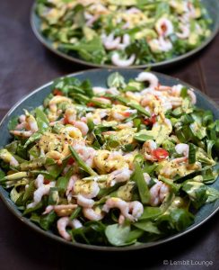 Shrimp salad with passion fruit dressing chili sugar peas Mache LCHF