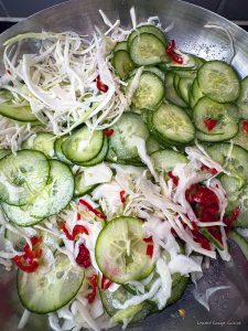 pickled cucumber and cabbage salad with Asian flavors, crunchy and delicious